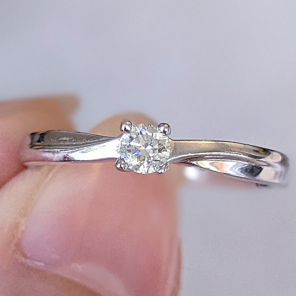 10K white gold diamond solitaire ring
